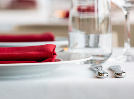 Poppy Red Napkin in a stadium setting