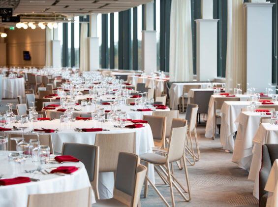 Arctic White tablecloths in a stadium setting