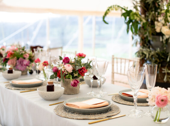 Coral napkins on a Pebble Grey table cloth