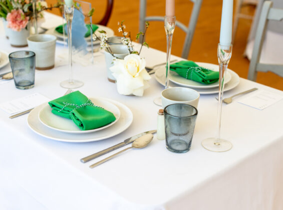 Two Mint Green napkin on Arctic White table cloth