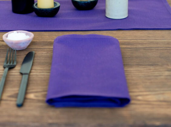 Purple Iris Napkin on rustic wooden table