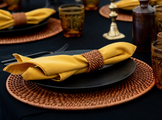 Honeycomb Gold napkin on Jet Black table cloth