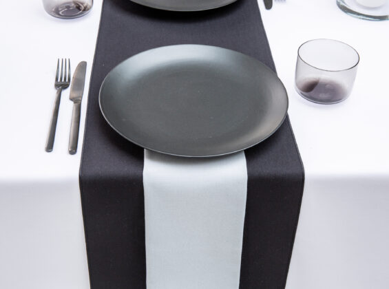 Pebble Grey napkin with Jet Black table runners and Arctic White table cloths