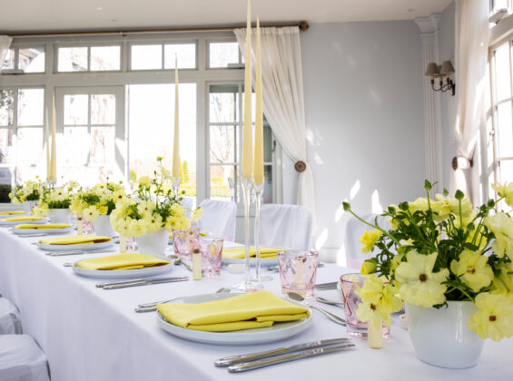 Sicilian Lemon napkins with Arctic White table cloths and chair covers