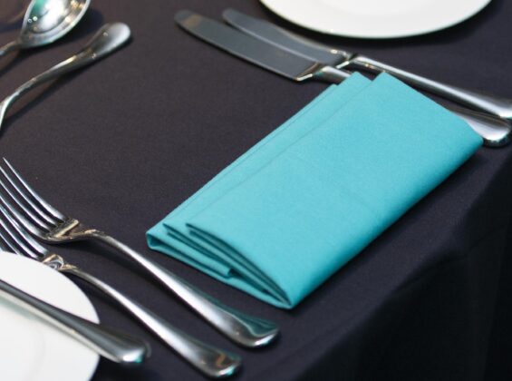 Turquoise Sea napkin on a Jet Black table cloth