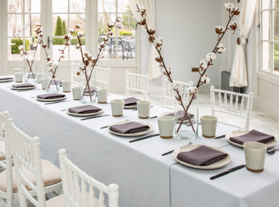 Twelve place settings of Wild Truffle napkins