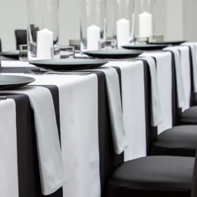Pebble Grey napkins with Jet Black table runners